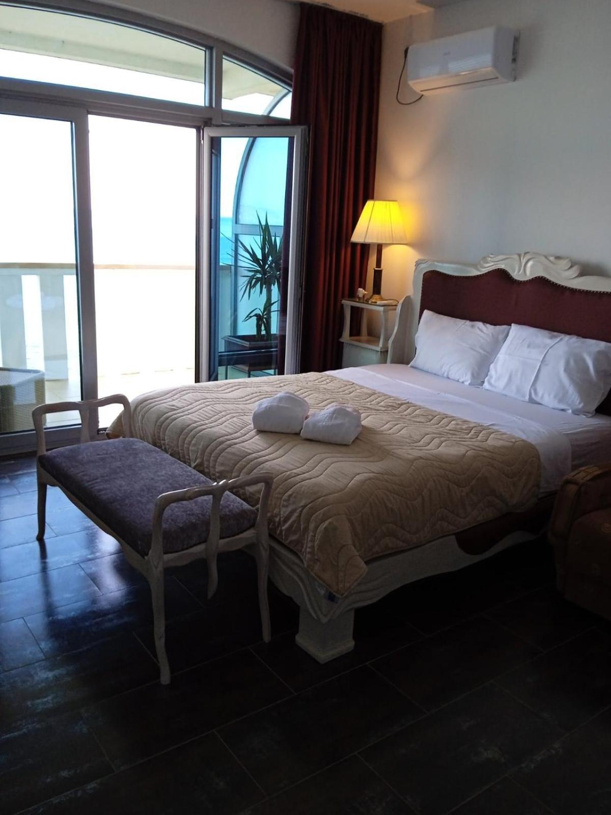 Sunset View Apartments Bar Bilik gambar
